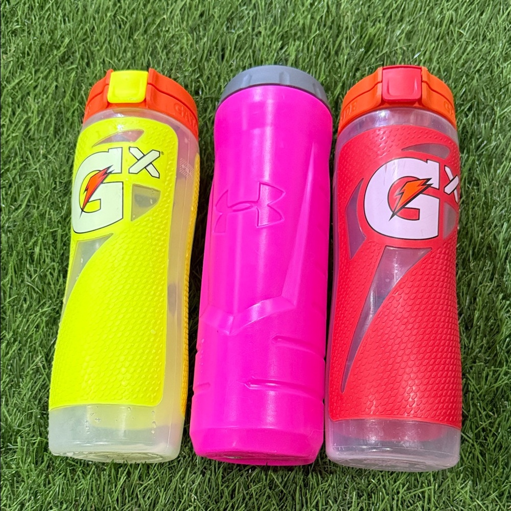 3 water bottles - 2 Gatorade X Bottled and 1 Under Armour Bottle